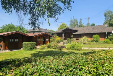 Steinhauer Holzblockhaus mit Teilkeller und Gartenhaus als Festwohnsitz in 57632 Burglahr!