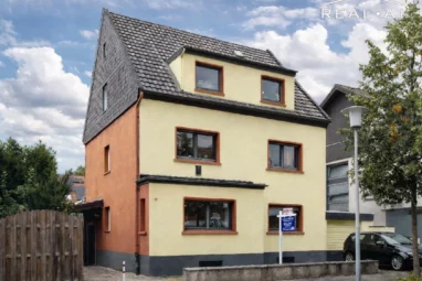 Kapitalanlage mit Entwicklungspotenzial: 2-3-Familienhaus + Nebengebäude