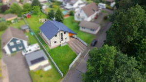 Verklinkertes Einfamilienhaus mit Wintergarten, Garage und Garten in ruhiger Wohnlage!